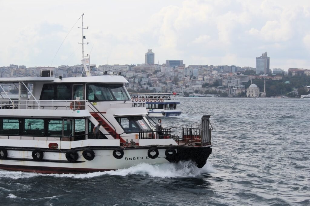 Passenger ferry crossing the Bosphorus strait between Istanbul's European and Asian sides.